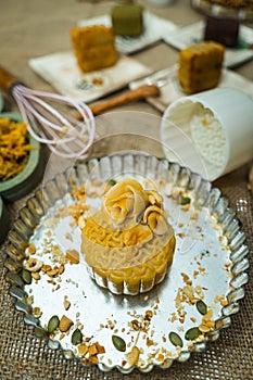 The wooden mold for moon cake, homemade cantonese moon cake pastry on baking tray before baking for traditional festival