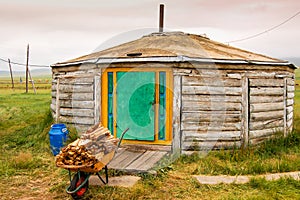 Wooden Mongolian ger & firewood photo