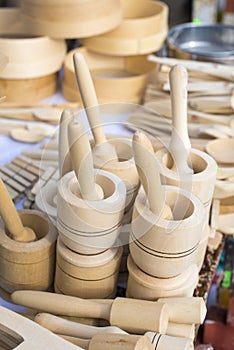 Wooden mortars and pestles for sale at a market