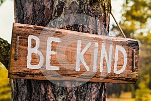 Wooden motivating sign - Be kind photo
