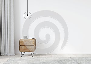 Wooden nightstand in the loft style with curtains on a white wall background