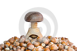 wooden nutcracker and hazelnuts