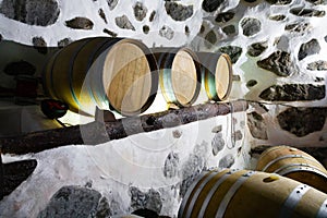 Wooden Oak Barrels At Wine Storeroom in Cellar