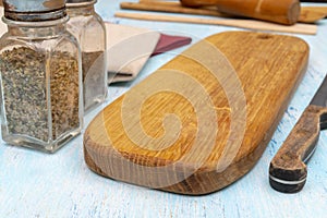 Wooden oak cutting board. Kitchenware. Copy space