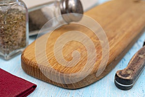 Wooden oak cutting board. Kitchenware. Copy space