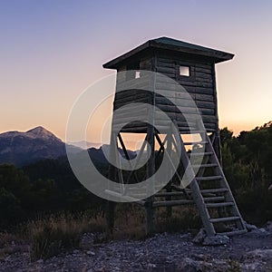 Wooden observation tower in a forest in Cati Alicante, Spain at sunset