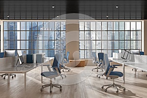 Wooden office room interior with pc computer on table, panoramic window