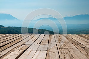 Wooden old background on natural background with mountain and sk