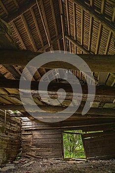 Wooden old barn roof from inside. Texture  background. photo