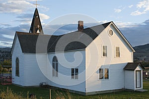 Wooden old church on sunset