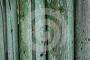 Wooden old dark grey logs background with cracks and splits