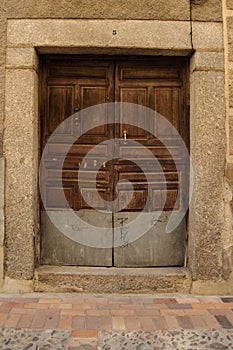 Wooden Old Door of a House in a Village in Spain