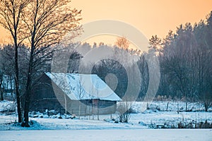 Wooden old house in winter