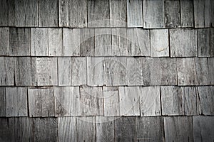 Wooden old retro style roof texture on old house.