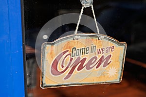 Wooden open sign board wood on windows shop restaurant cafe store Open signboard