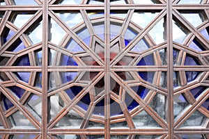 Wooden ornament with colorful glass