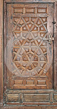 Wooden ornate door, Old Cairo, Egypt photo