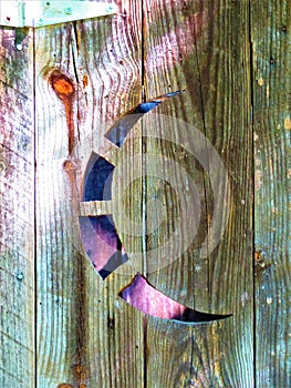 Wooden outhouse door crescent moon