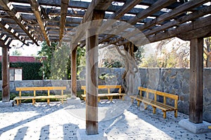 Wooden Overhang with benches photo