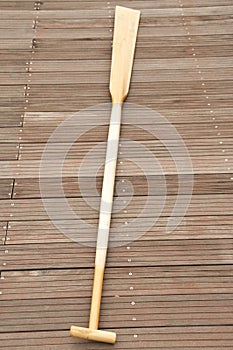 Wooden paddle for rowing