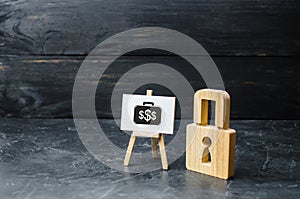 Wooden padlock and sign with the image of investment. Protection money concept. Safe and secure investment, insurance.