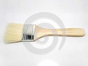 Wooden paint brush use to color paint the house