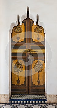 The wooden painting of door at Bahia Palace in Marakesh