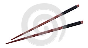 Wooden pairs of chopsticks on white background