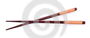 Wooden pairs of chopsticks on white background