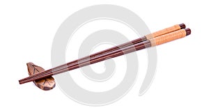 Wooden pairs of chopsticks on white background