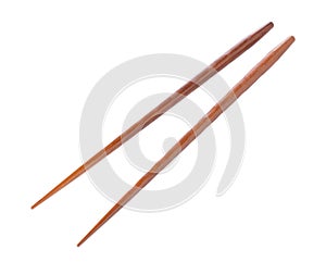 Wooden pairs of chopsticks on white background