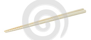 Wooden pairs of chopsticks on white background