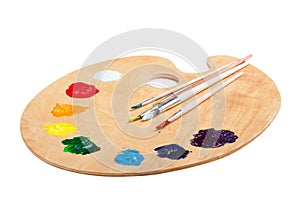 Wooden palette with paint on white