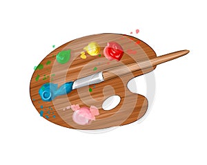 Wooden palette for paints from multicolored paints. Splash of watercolor, colored drawing, realistic