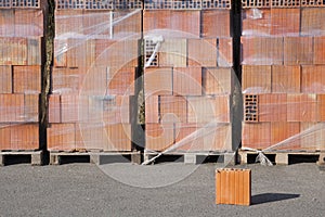 Wooden pallet with bricks.