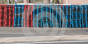 Wooden pallets of blue and red colors