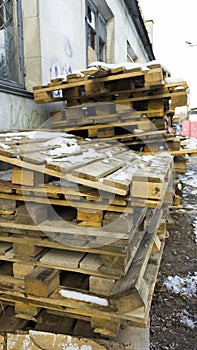 Wooden pallets, dirty old transport pallets outdoor