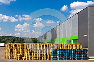 Wooden pallets heap in the cargo warehouse