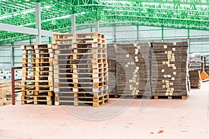 The wooden pallets, pallets ready for use packing keep material boxes or product boxes in warehouse area