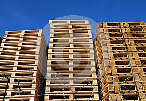 wooden pallets placed in warehouse coutyard