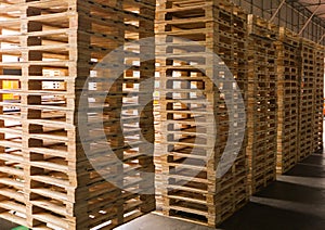 Wooden pallets stack at the freight cargo warehouse for transportation and logistics industrial