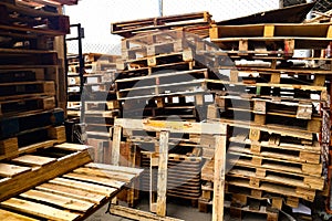 Wooden pallets stack at the freight cargo warehouse for transportation and logistics industrial at Bangkok