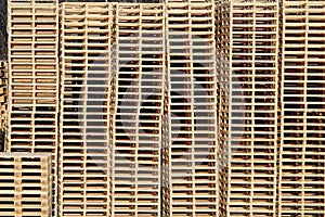 Wooden pallets on stock in factory backyard