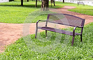 wooden park bench at the public park image