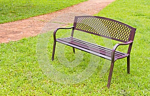 wooden park bench at the public park image