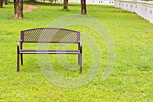 wooden park bench at the public park image