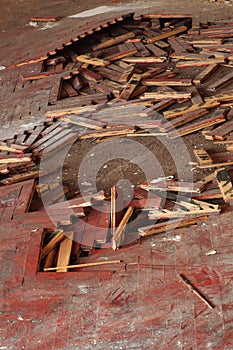 Wooden parquet floor red crumbled