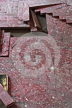 Wooden parquet floor red damaged