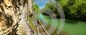 Wooden path along the river