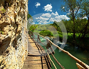 Wooden path along the river